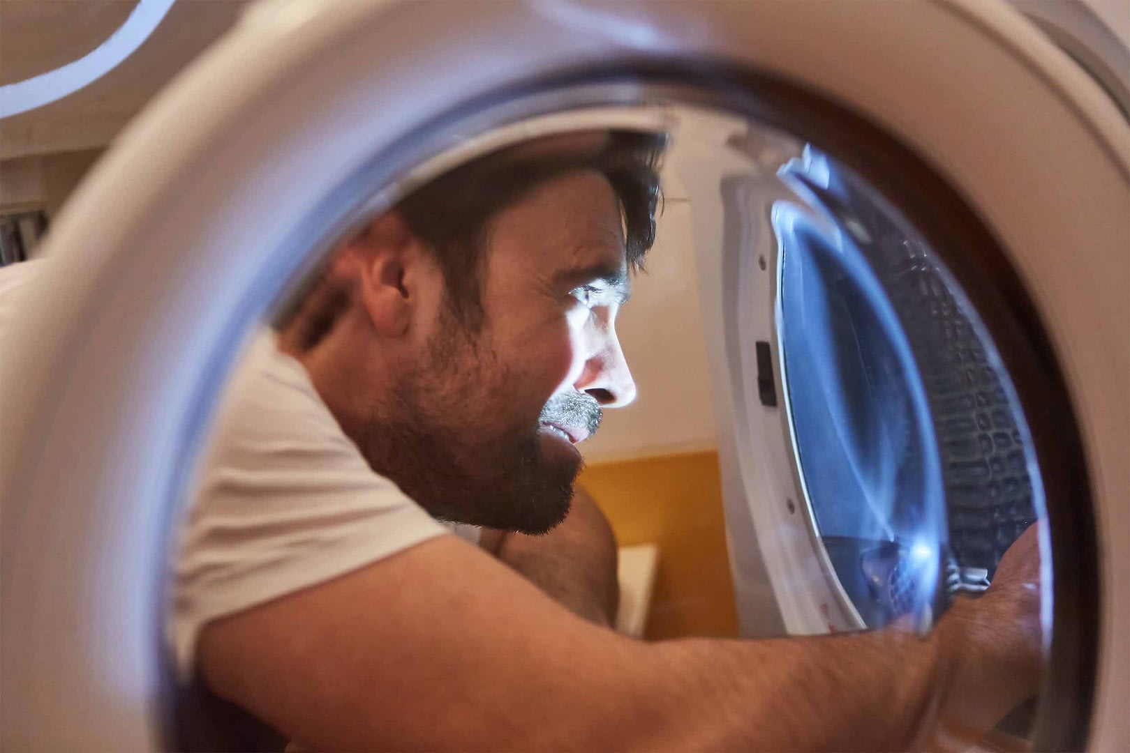 Servicing commercial tumble dryer
