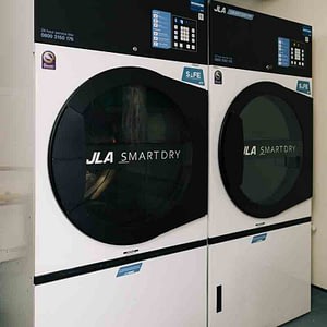 Commercial tumble dryers in situ