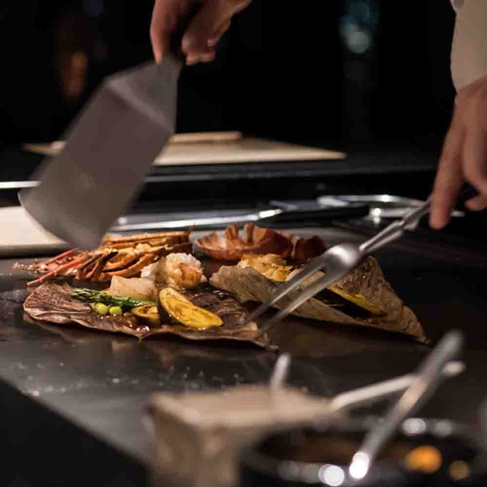 Chefs with commercial catering equipment